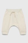 Дитячі спортивні штани United Colors of Benetton колір бежевий однотонні (3144913)